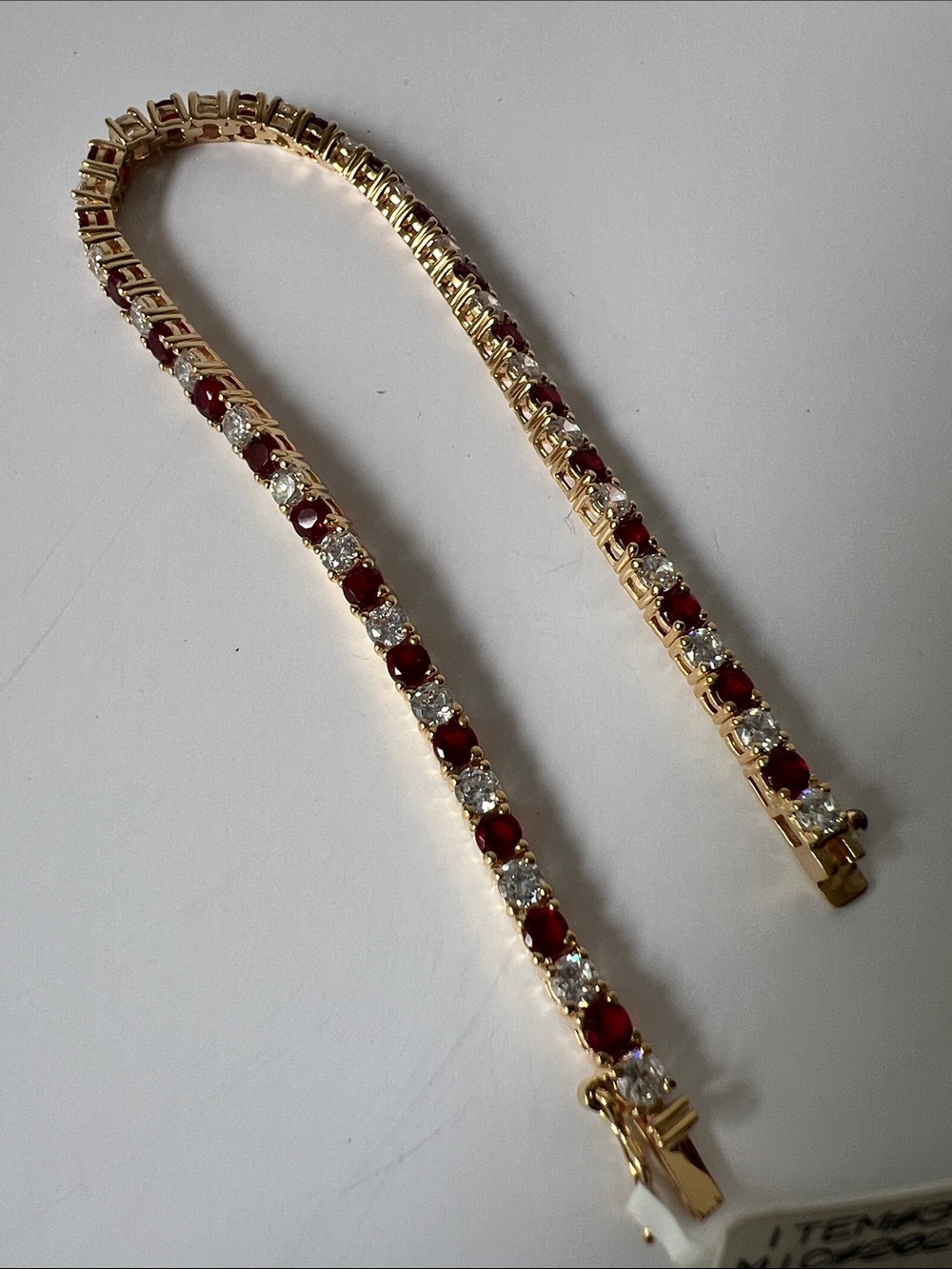 18 Kt Gold over Sterling Silver Tennis Bracelet Ruby-Red and Clear Stones New